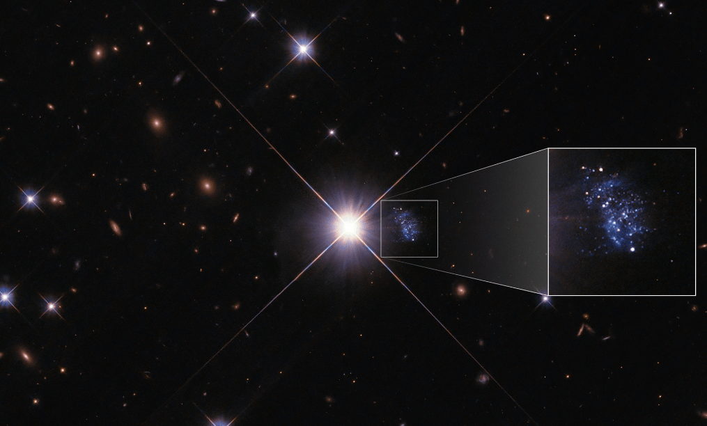 Маленькая галактика, скрытая звездой, позволяет заглянуть в прошлое Вселенной